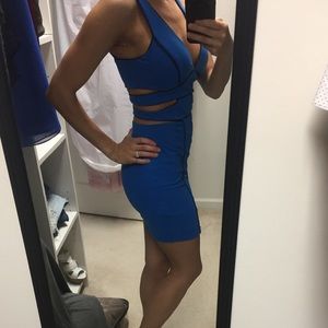 Blue bodycon dress with cut outs